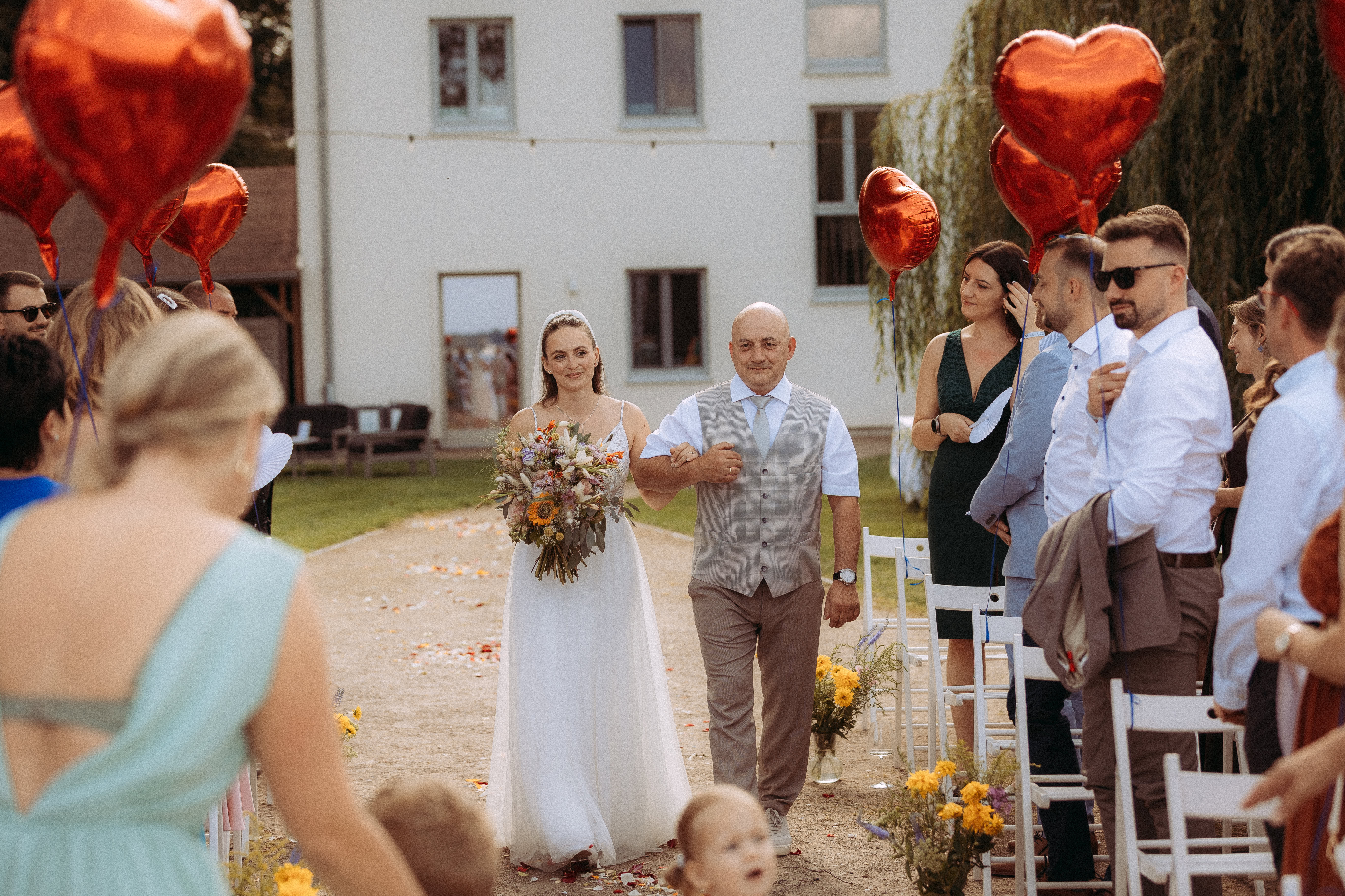 Eco-friendly garden design with native plants and a stone path.