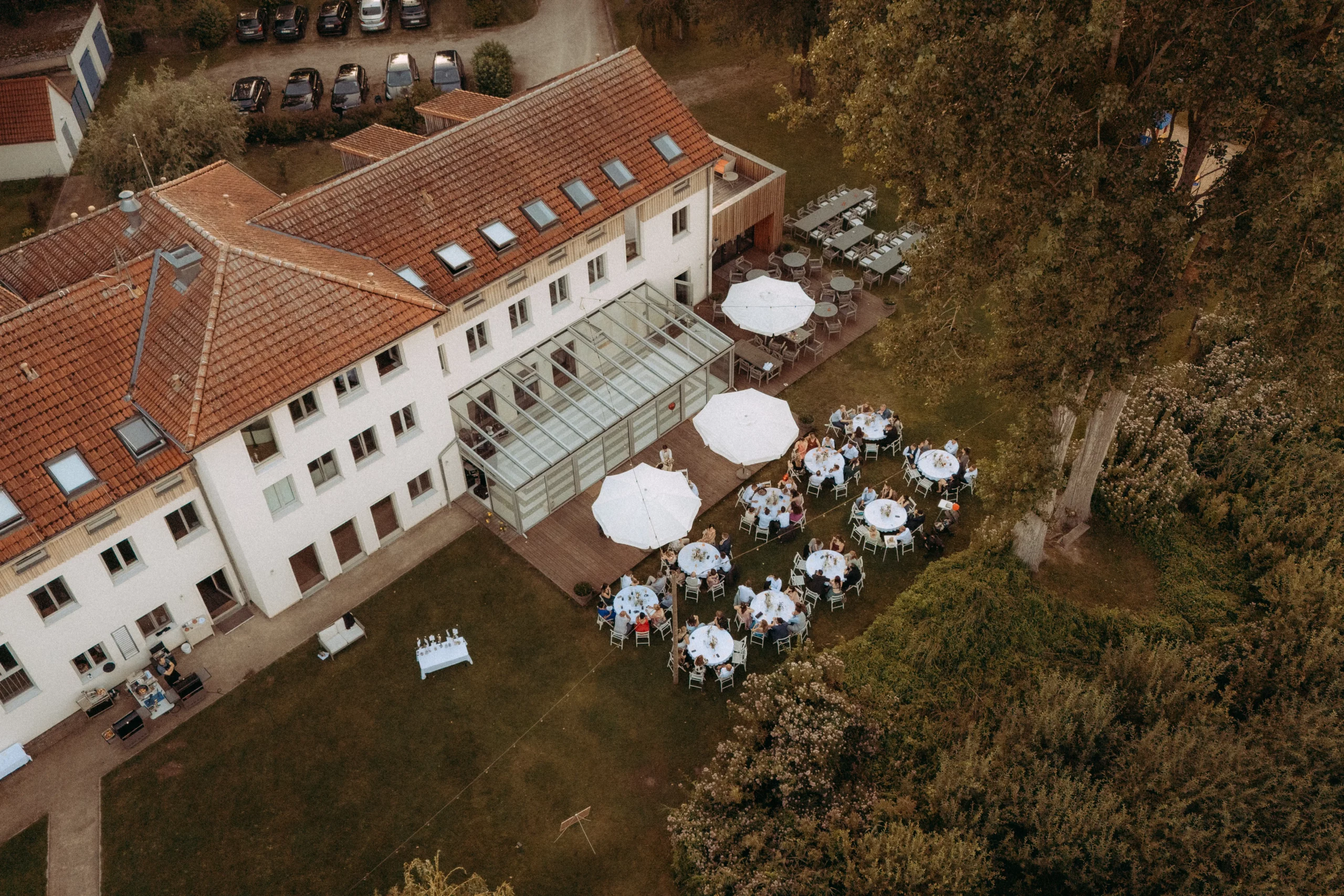 People dining outdoors at a catered event